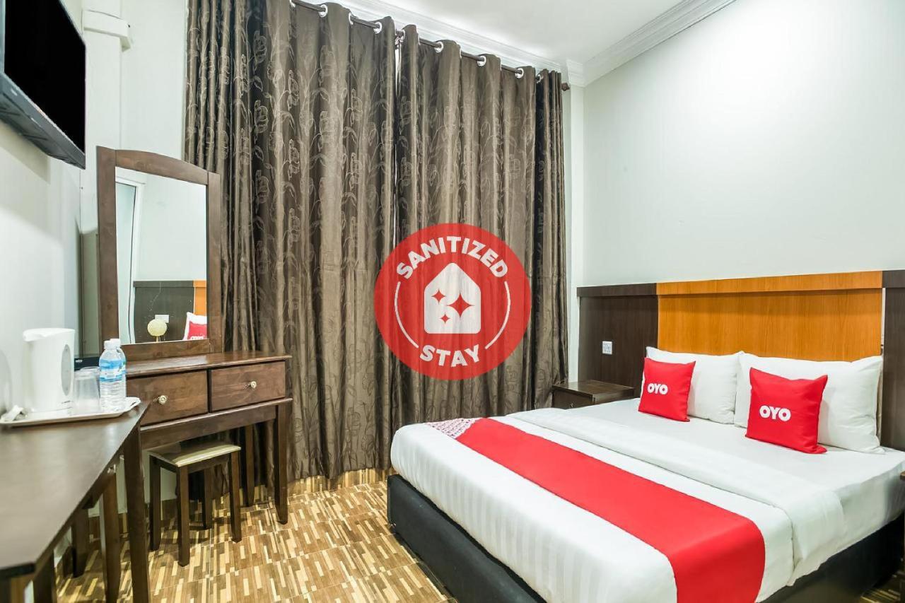 Oyo 89712 Grand Inn Semporna Extérieur photo