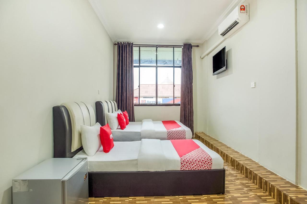 Oyo 89712 Grand Inn Semporna Extérieur photo