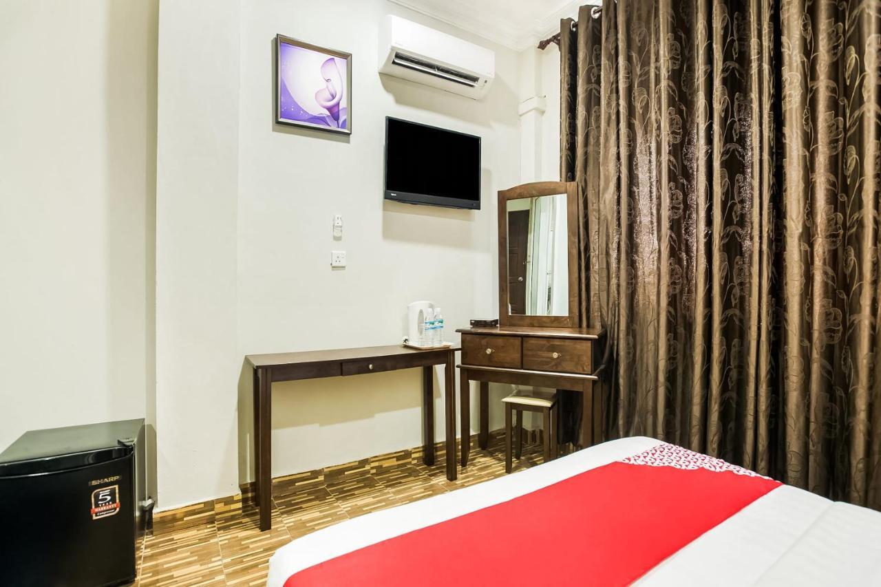 Oyo 89712 Grand Inn Semporna Extérieur photo