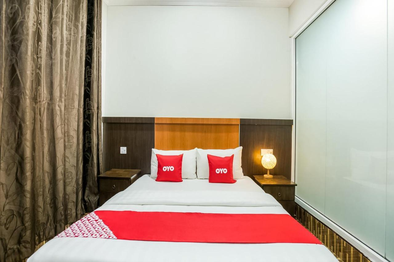 Oyo 89712 Grand Inn Semporna Extérieur photo